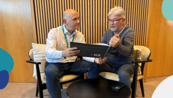 Andy Knowles and David Charles sat looking in 'Yorkshire's Finest Photobook